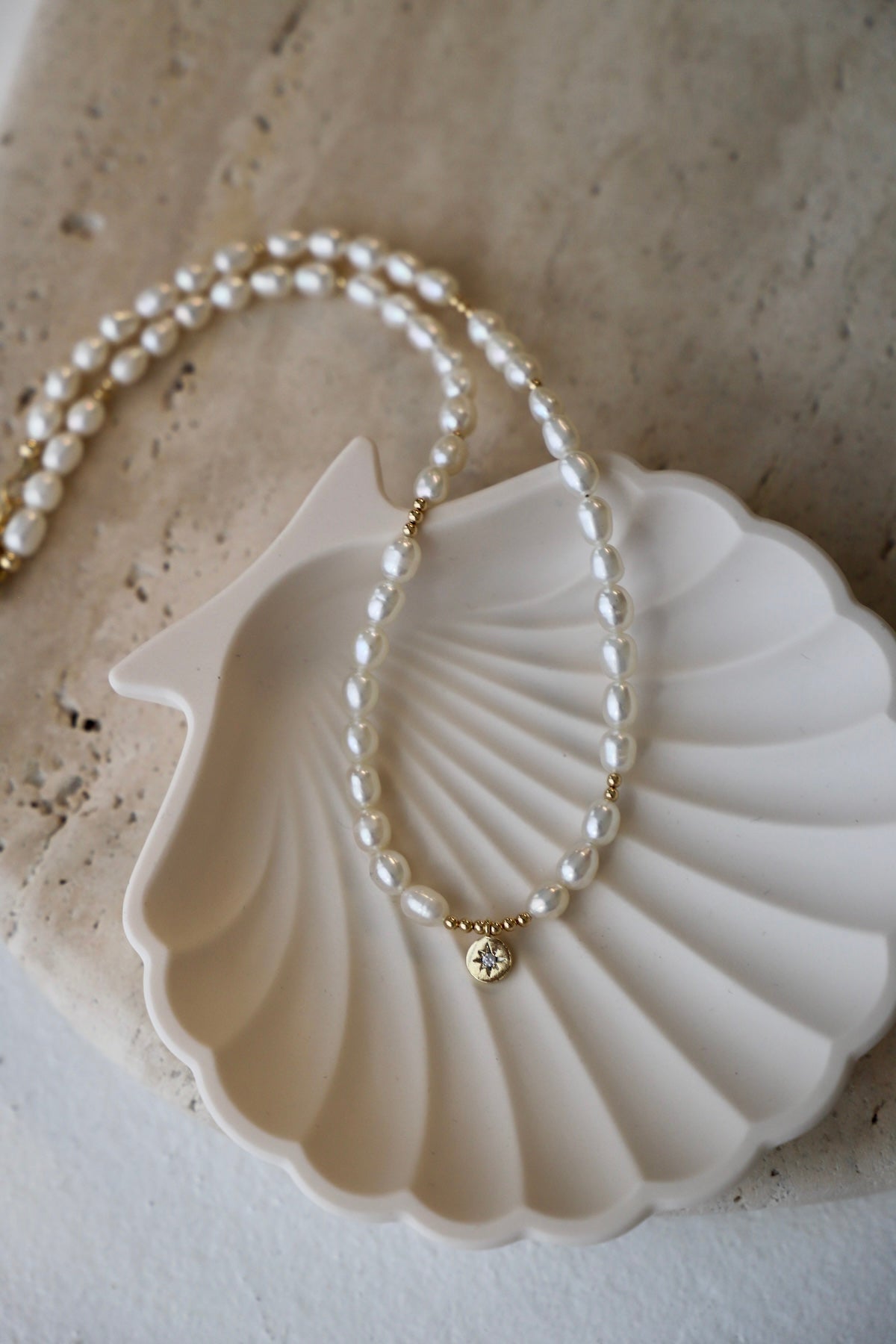 Collier médaillon étoile en perles