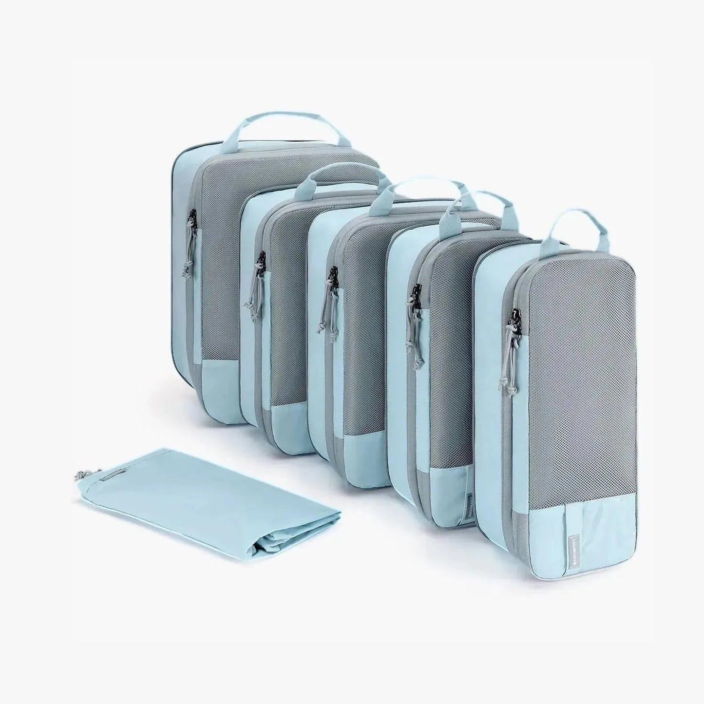 Cubes de compression faisant partie du kit de voyage Faro 
