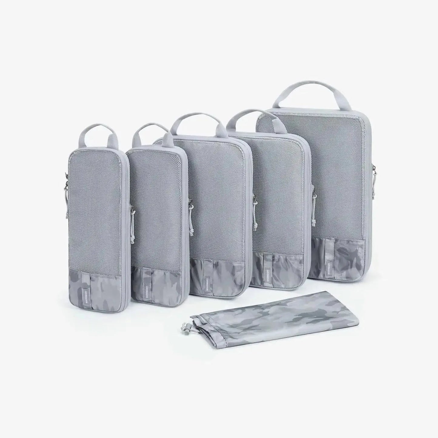 Cubes de compression faisant partie du kit de voyage Faro 