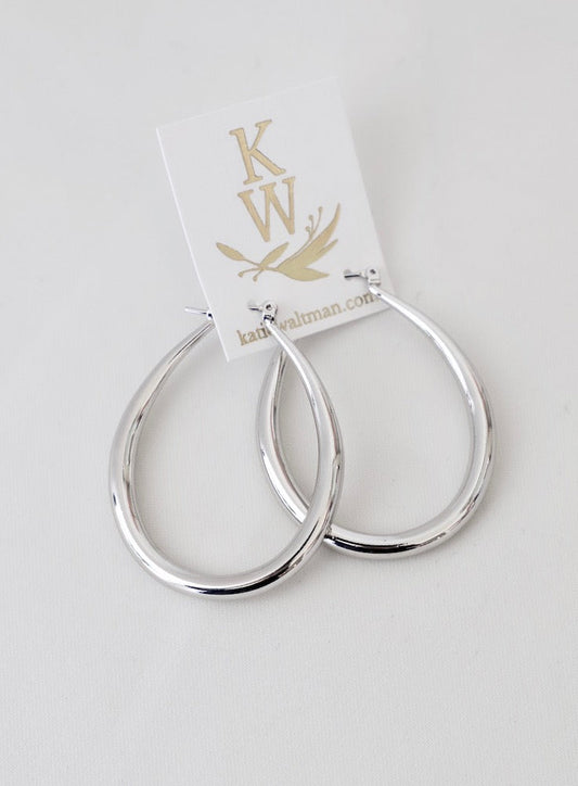 GRANDES BOUCLES D'OREILLES CRÉOLES EN FORME DE LARME