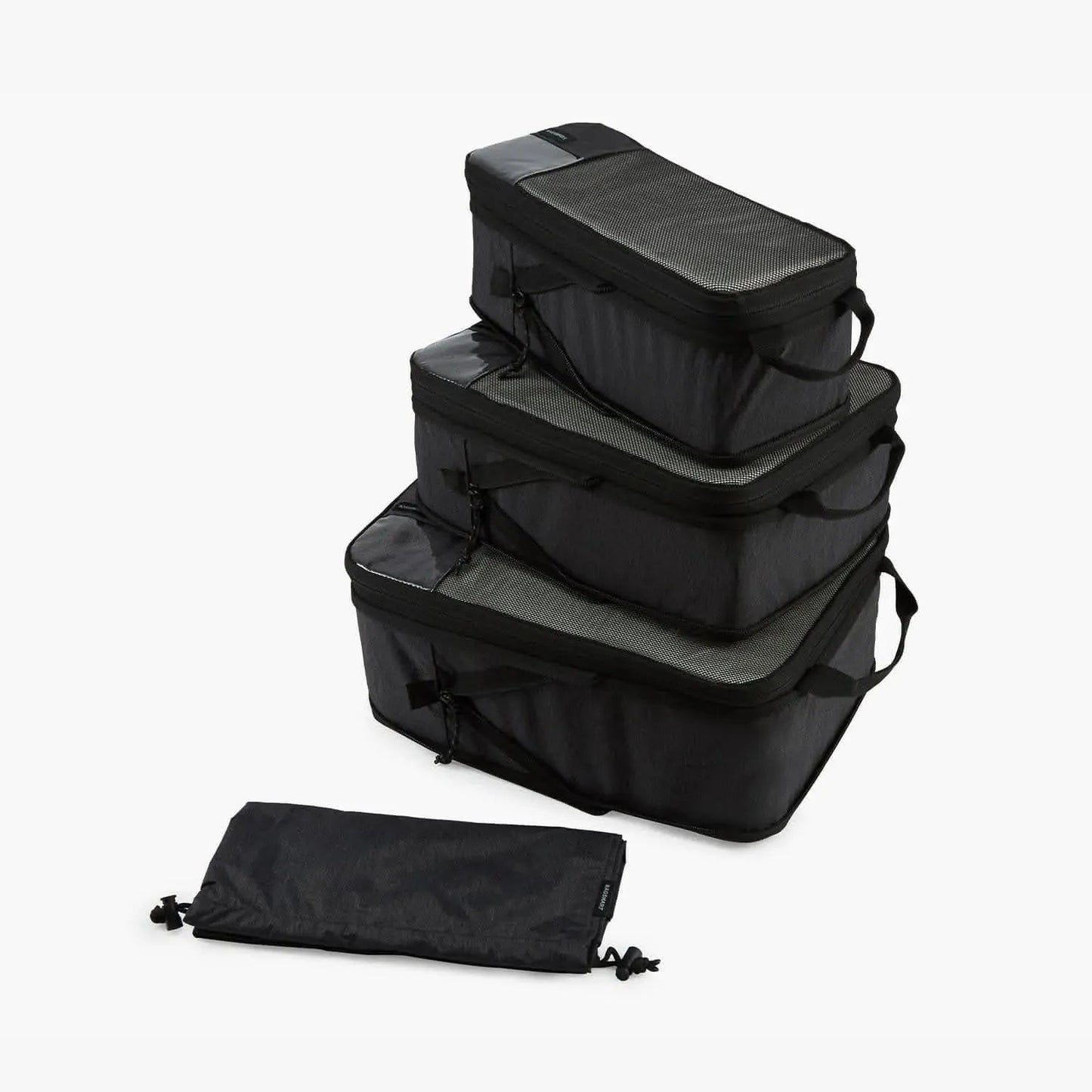 Cubes de compression faisant partie du kit de voyage Faro 